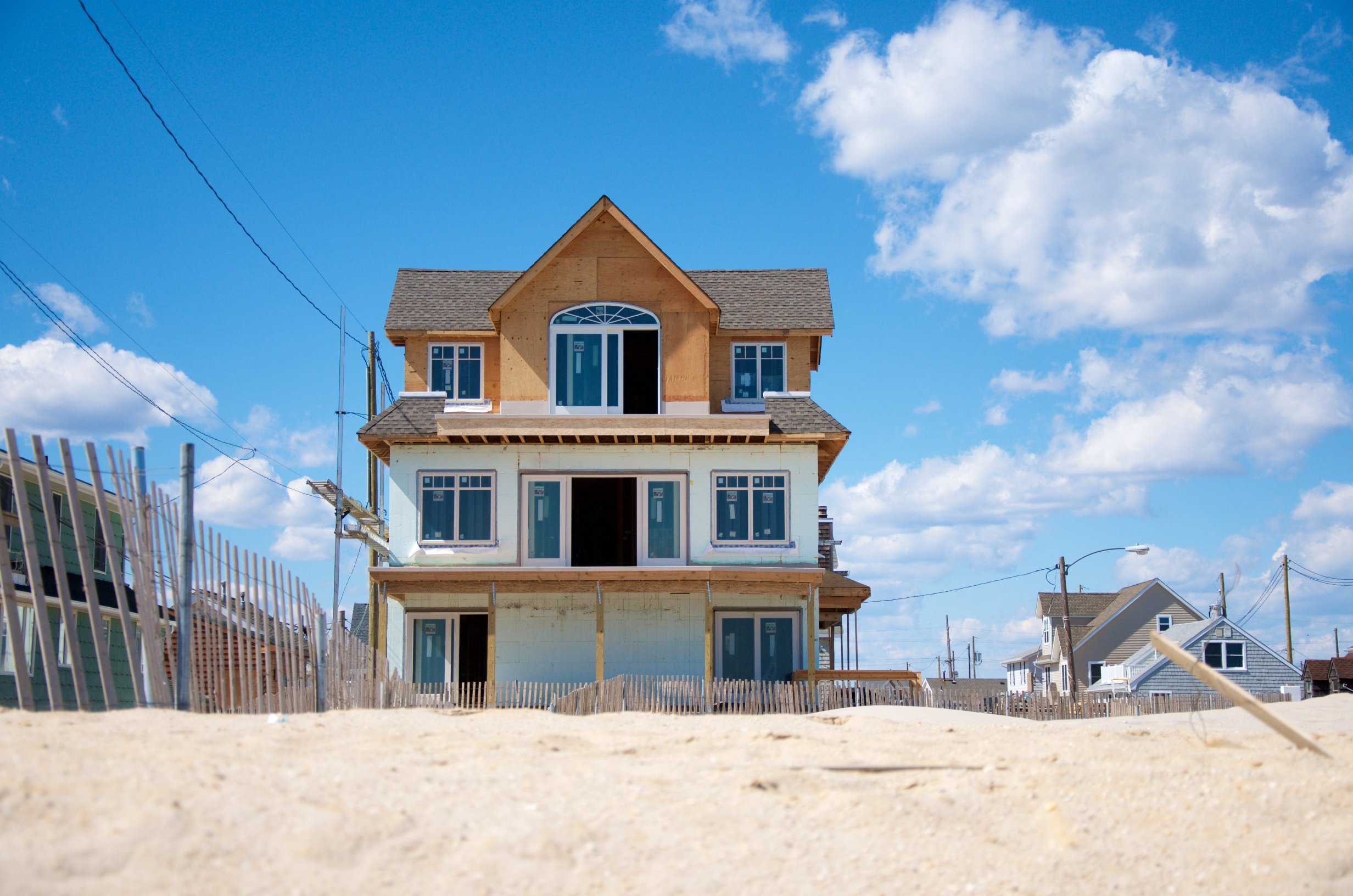 Exterior of a custom oceanfront ICF concrete home under construction in Ortley Beach NJ