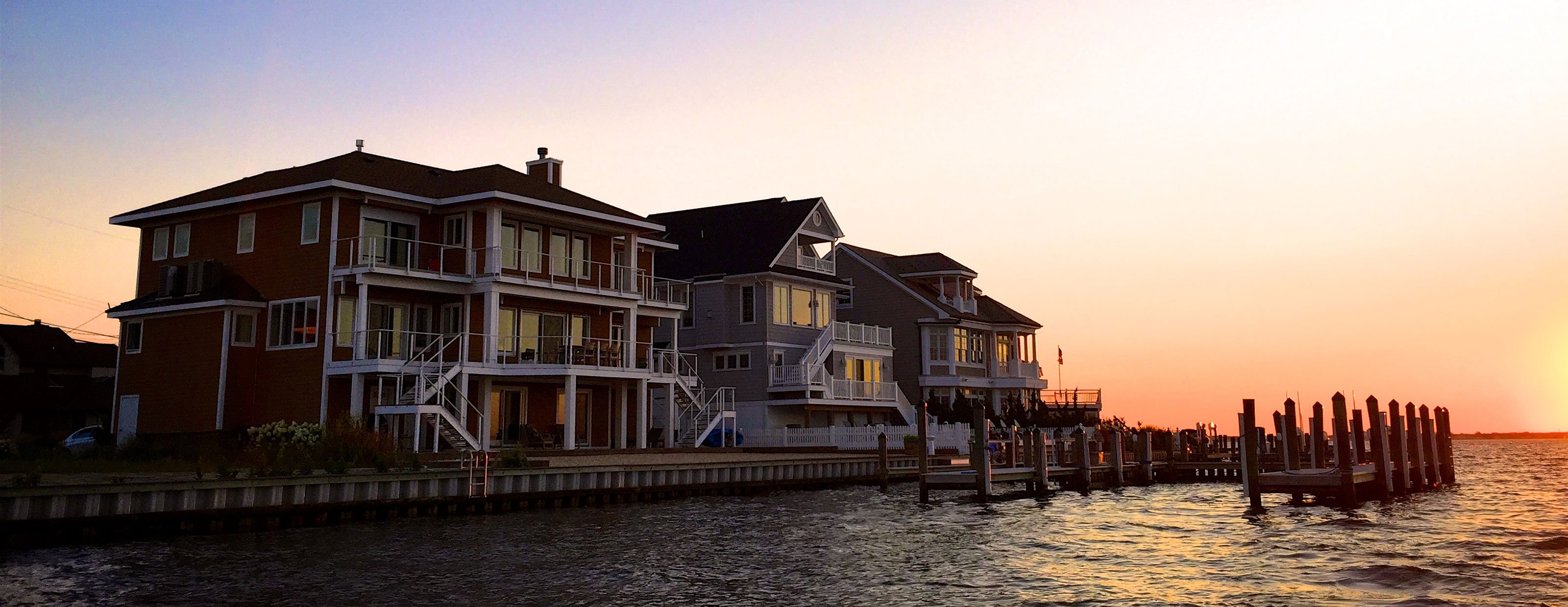 Custom waterfront homes by JJC Inc. at sunset on the New Jersey Shore